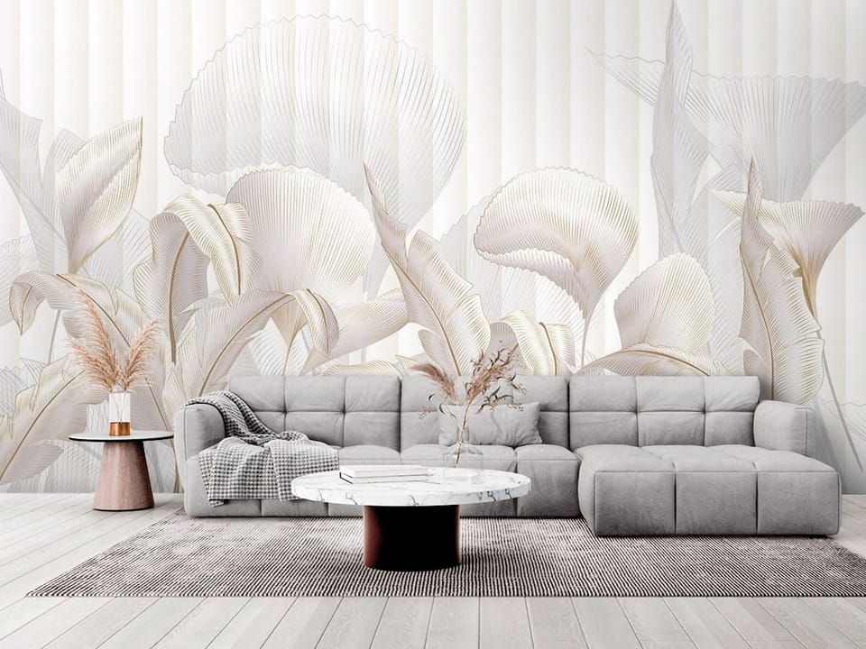 Fototapeta z dekoracyjnymi liśćmi i kwiatami na jasnym tle - elegancki salon w stylu minimalistycznym